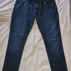 Barely worn INC blue jeans